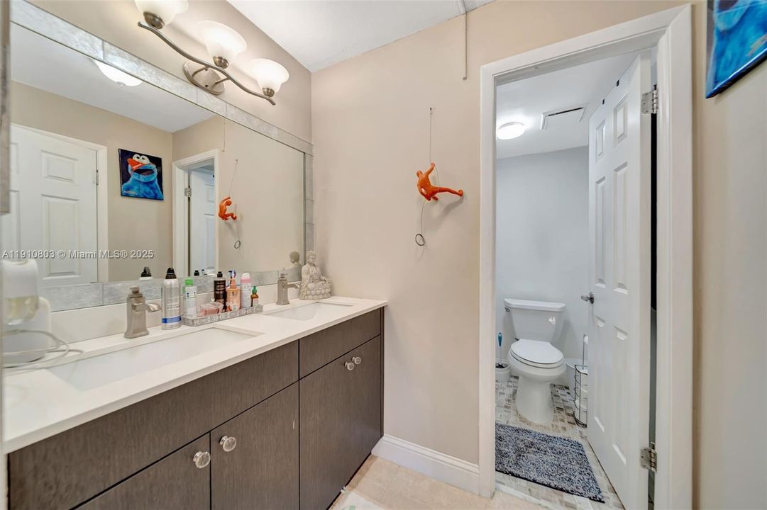 Primary Bathroom with dual sinks - Separate commode/shower room - all Remodeled