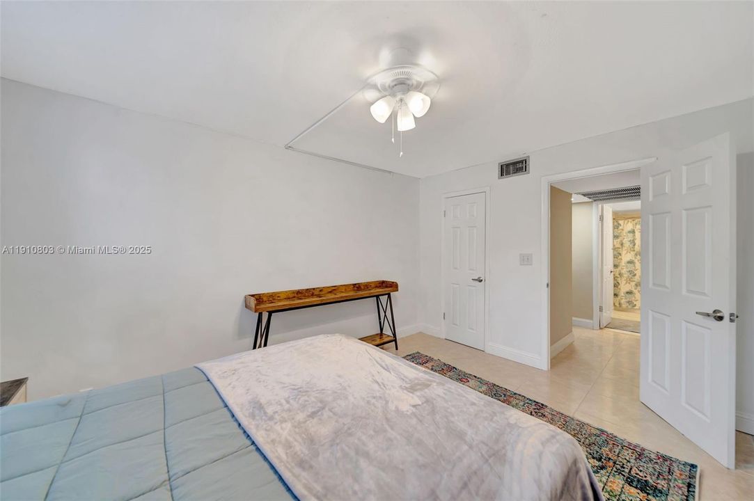 Guest bathroom adjacent to bedroom
