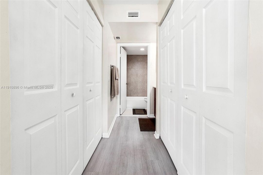 Bedroom 1 Hallway with left & right Closets
