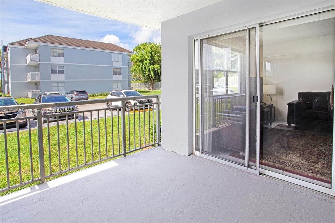 Patio as-is accessible from LR and BR 1