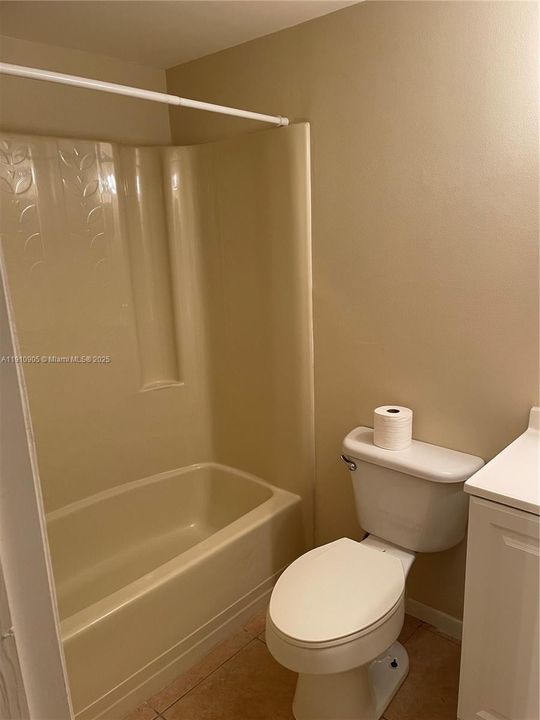 Guest bathroom with bathtub
