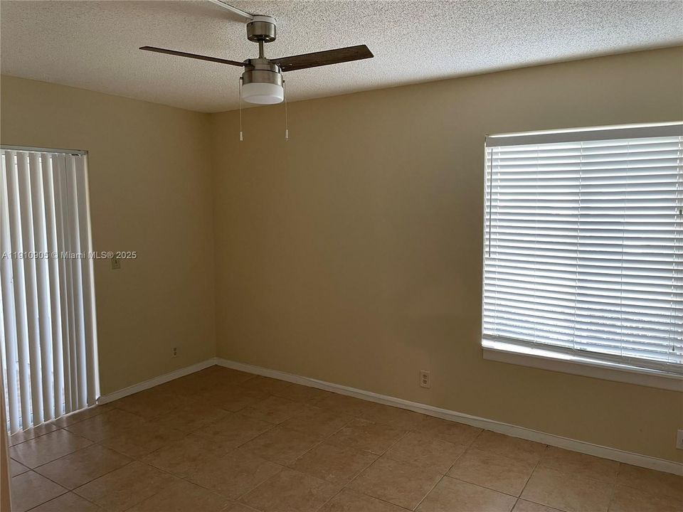 Master bedroom with ceiling fan