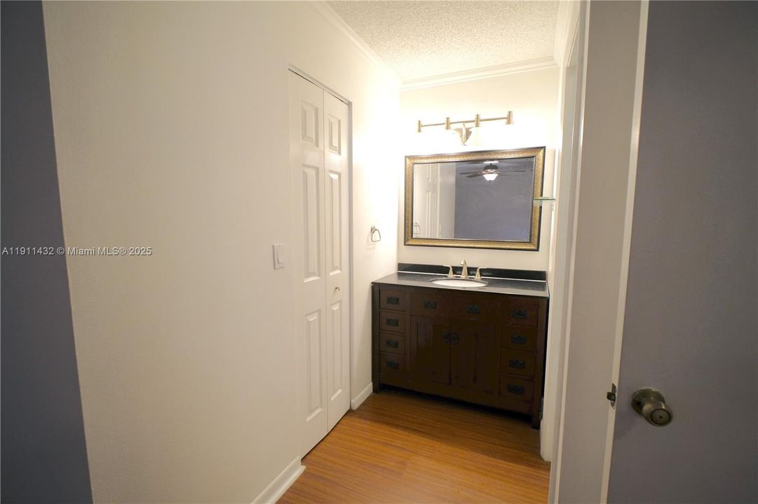 Master bath and primary walk-in closet