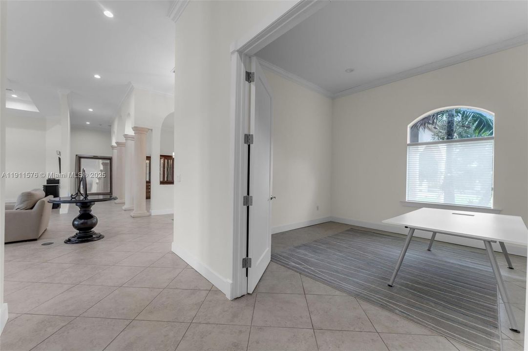 OFFICE OFF OF THE LIVING ROOM & FOYER