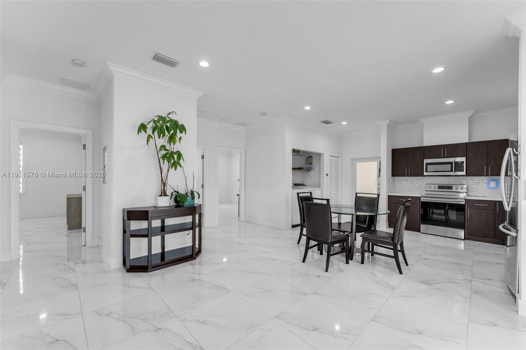 VIEW OF DINING & KITCHEN IN GUEST HOUSE