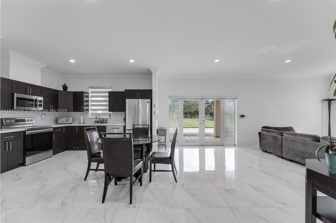 DOUBLE FRENCH DOORS INTO THE GUEST HOUSE