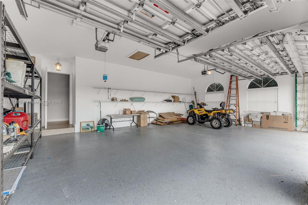 3 CAR GARAGE ATTACHED TO THE MAIN HOUSE