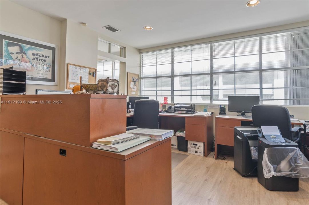 Another view of the front office and work stations