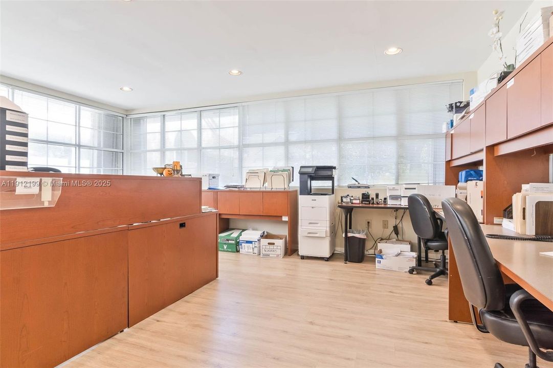 Front reception area and workstations for staff.  Lots of natural light