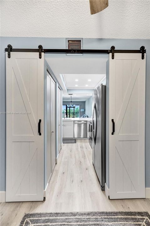 Closing this door will turn the den into a bedroom.