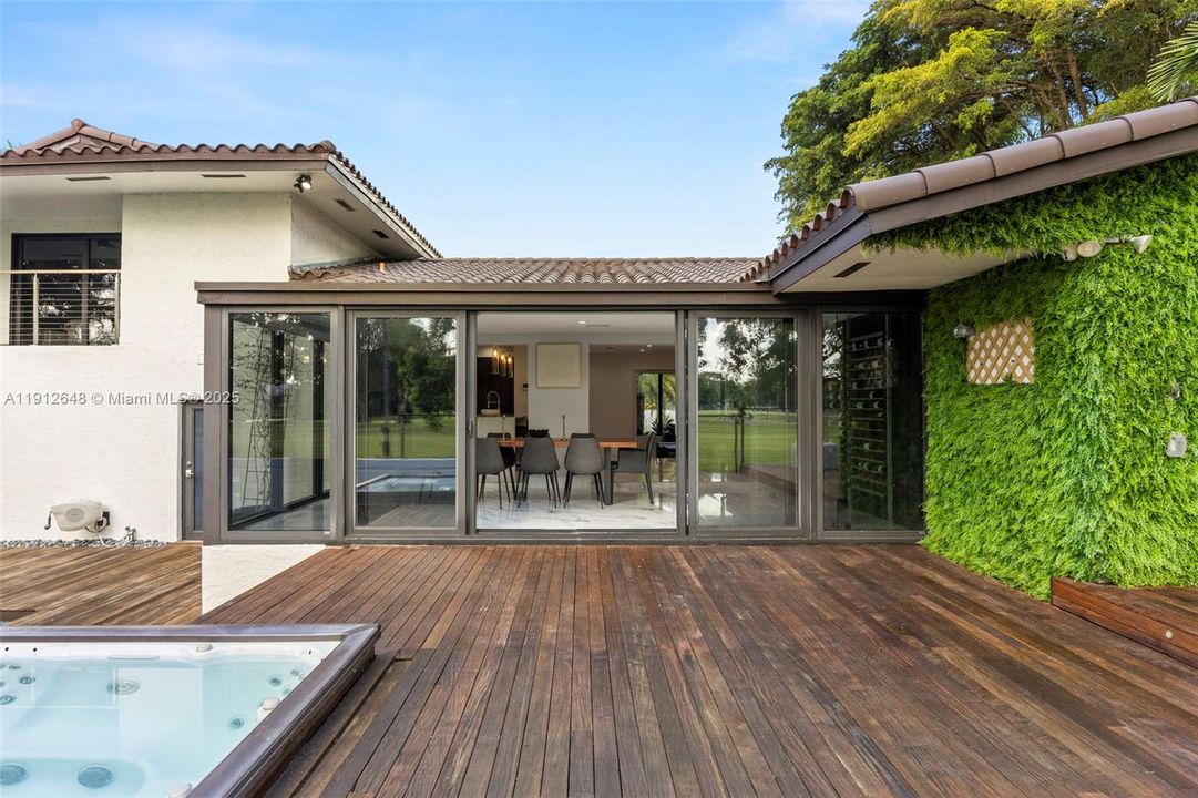 Teak pool deck overlooking Dining room