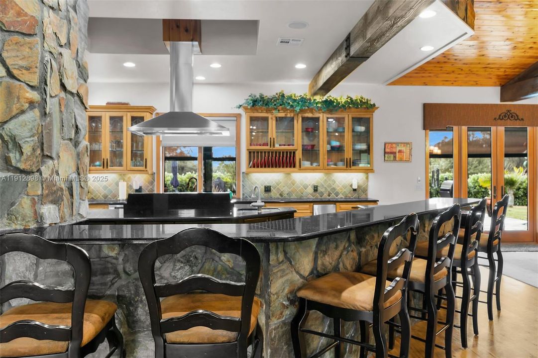 Stone archway to kitchen