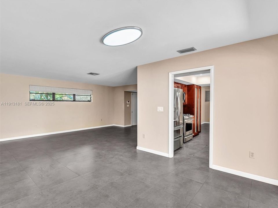 The dining room area is large enough to entertain your. family and guests alike