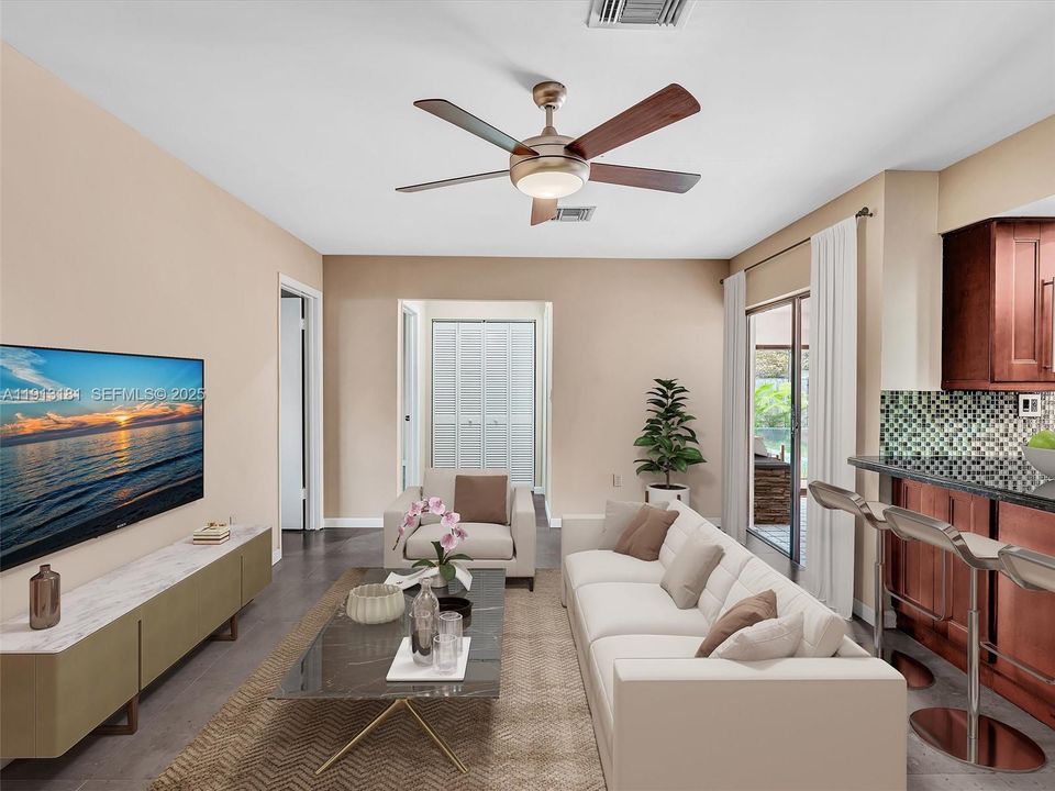 Virtual Staging for the family room showcases a central point of activity for your family. Close proximity to the kitchen, bathroom and flex room make this room a high traffic area.