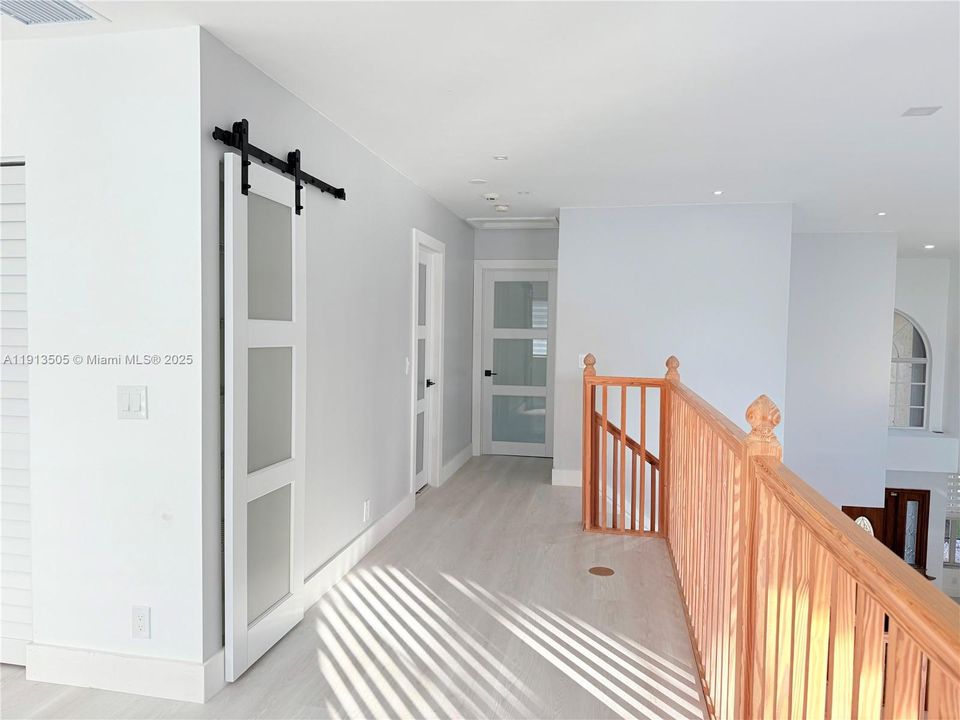 View from the Balcony to Bedrooms and Bathroom