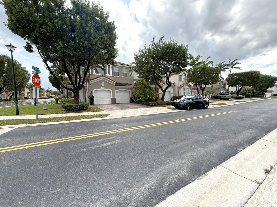 Street view, corner unit.