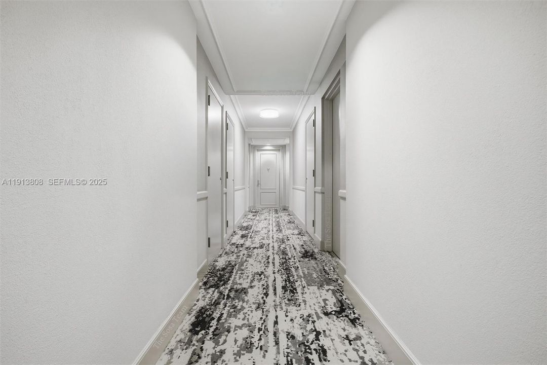 Renovated hallway with modern finishes!