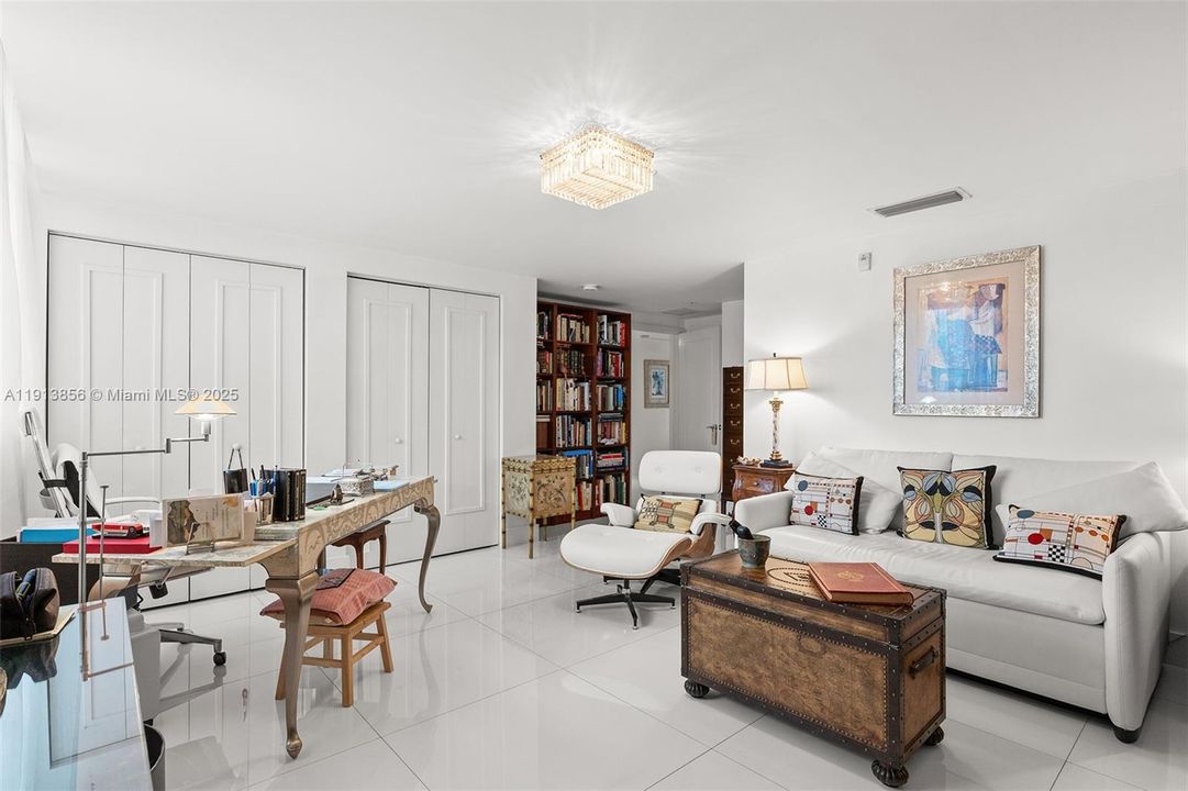 Large den can be used as a bedroom with en-suite full bathroom