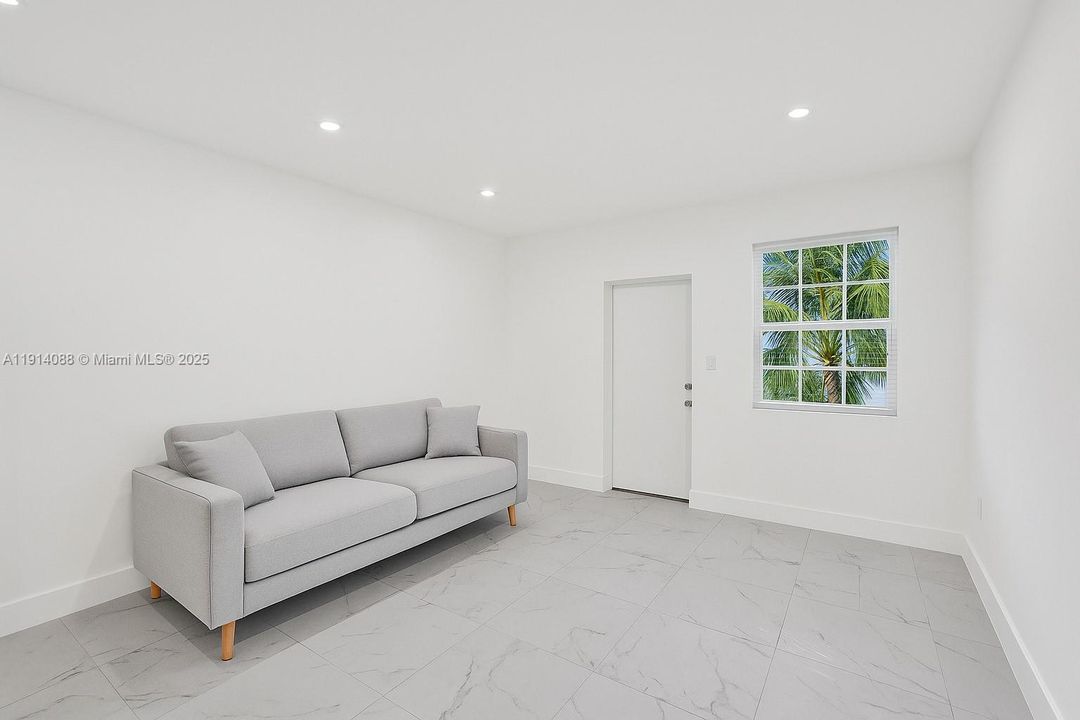 The unit is UNFURNISHED- This photo is VIRTUAL STAGED FOR VISUALIZATION