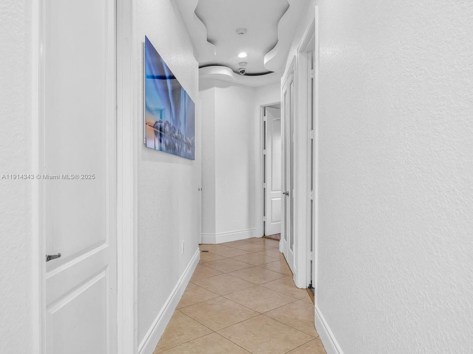 Hallway to the right wing where the secondary bedrooms are situated