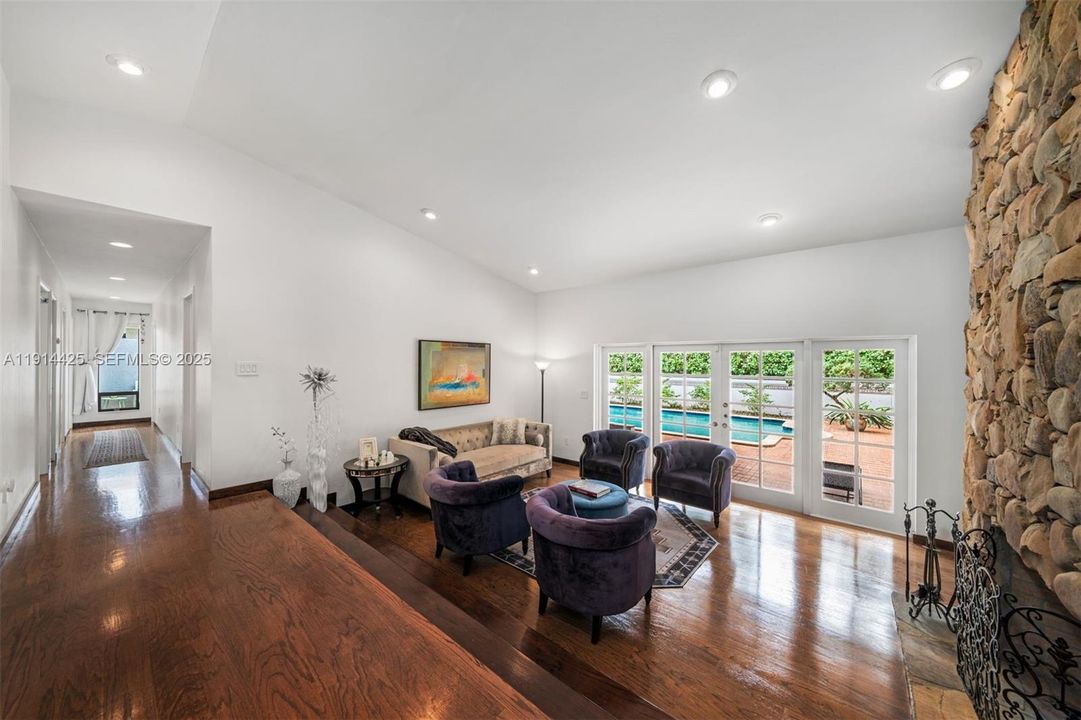Living room upon entry with outdoor access