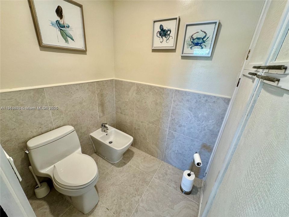 MODERN PRIMARY BATH WITH: STEAM SHOWER, SOAKING TUB AND BIDET & TOILET RM.