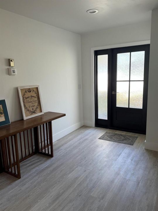 Entry with impact windows and door