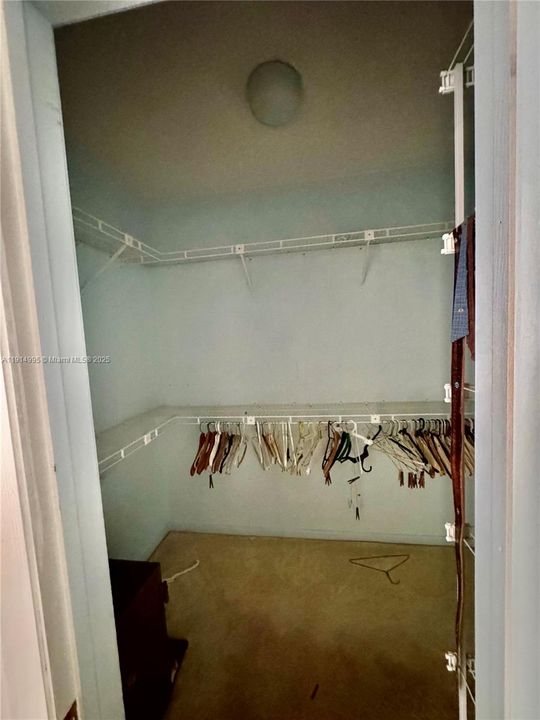 One of the two walk-closets in primary bedroom.