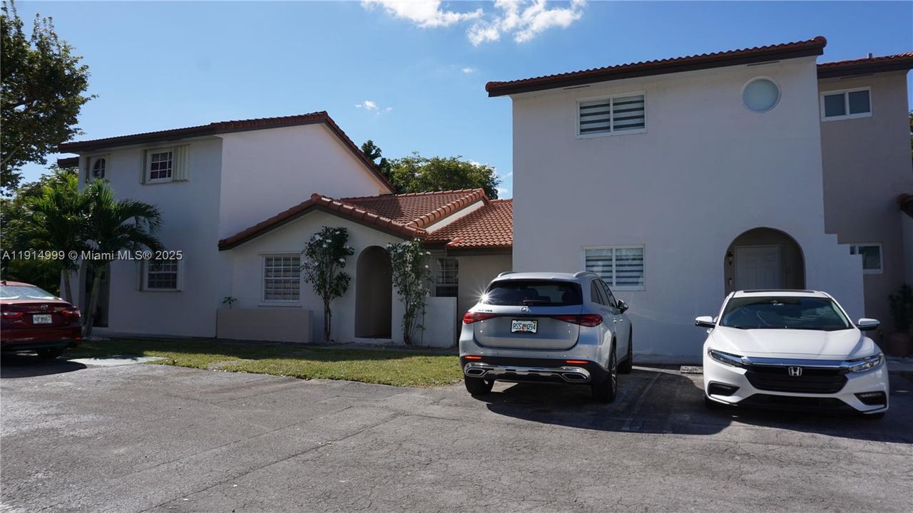 The two parking spaces on the right are the assigned spaces for this property.