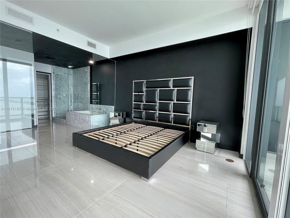 Master Bedroom with shades and black outs