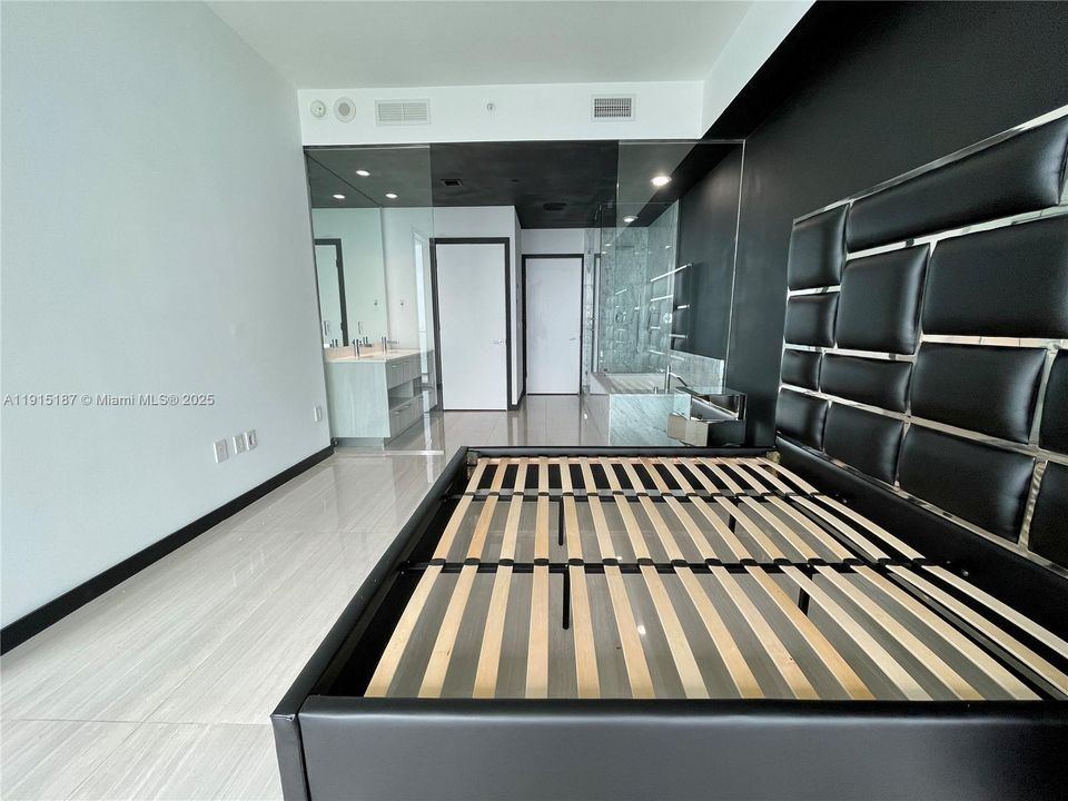 Master Bedroom with shades and black outs
