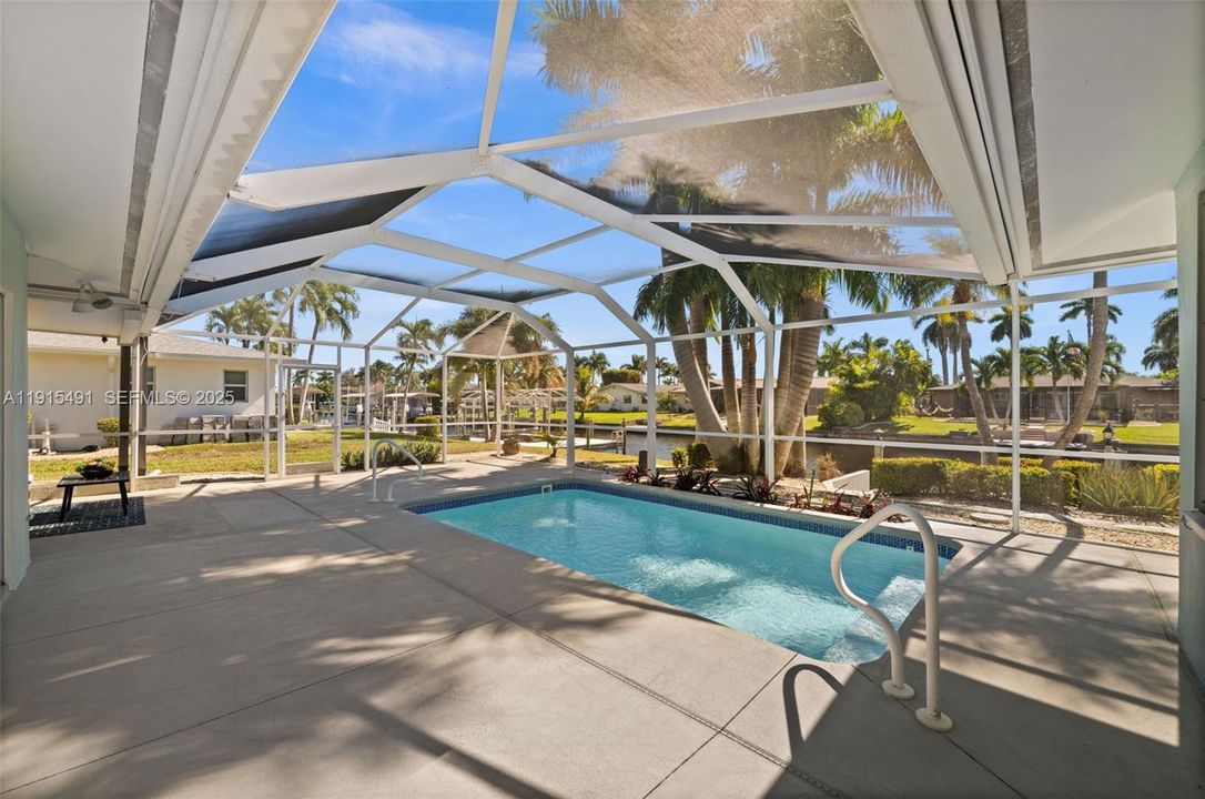Beautiful pool area overlooking the Gulf Access Canal