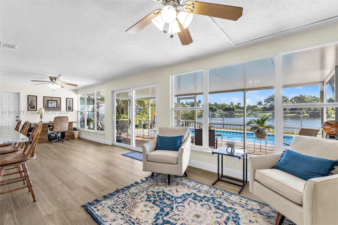 Florida room with view of water