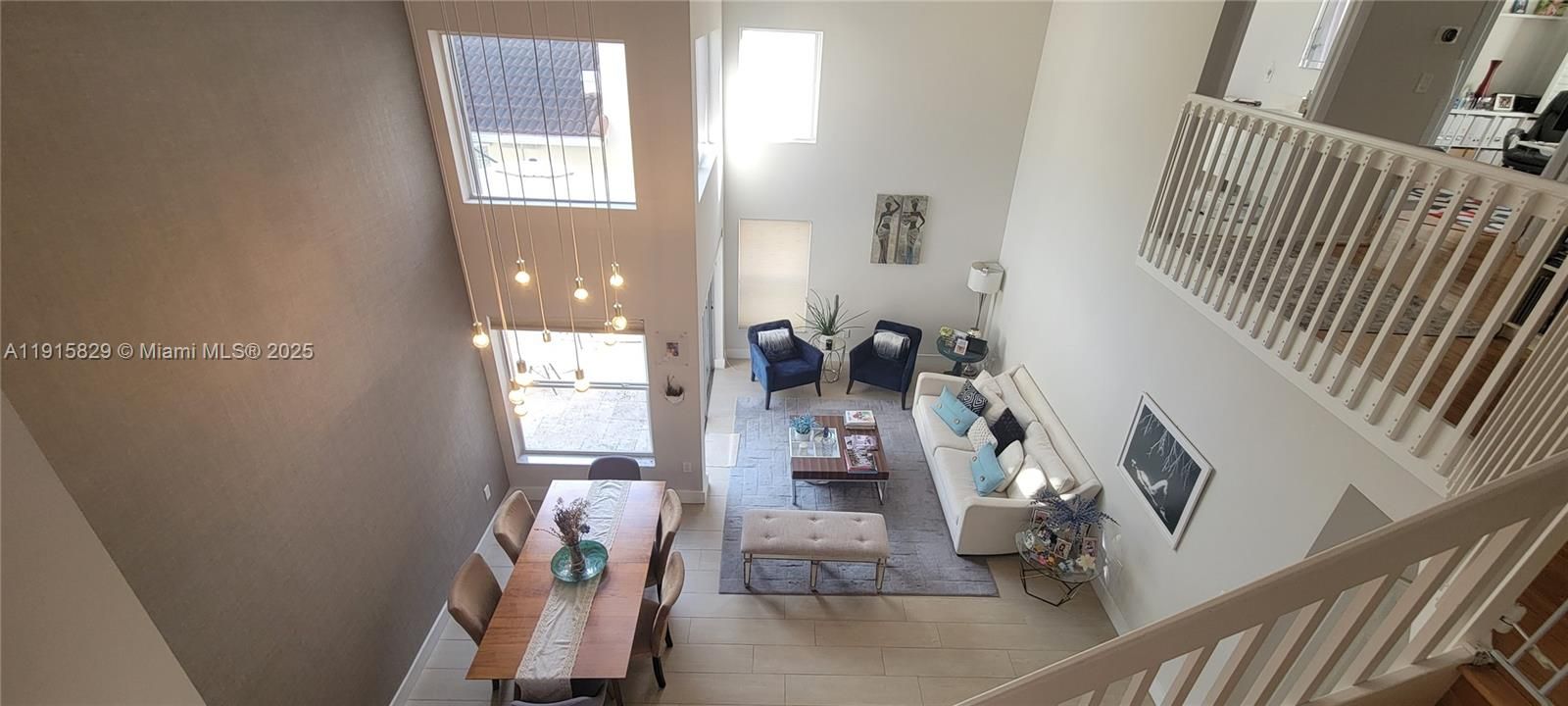 Two story ceiling living room