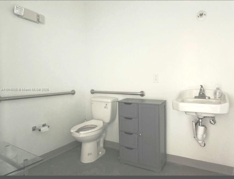 Ample bathroom in rear of unit