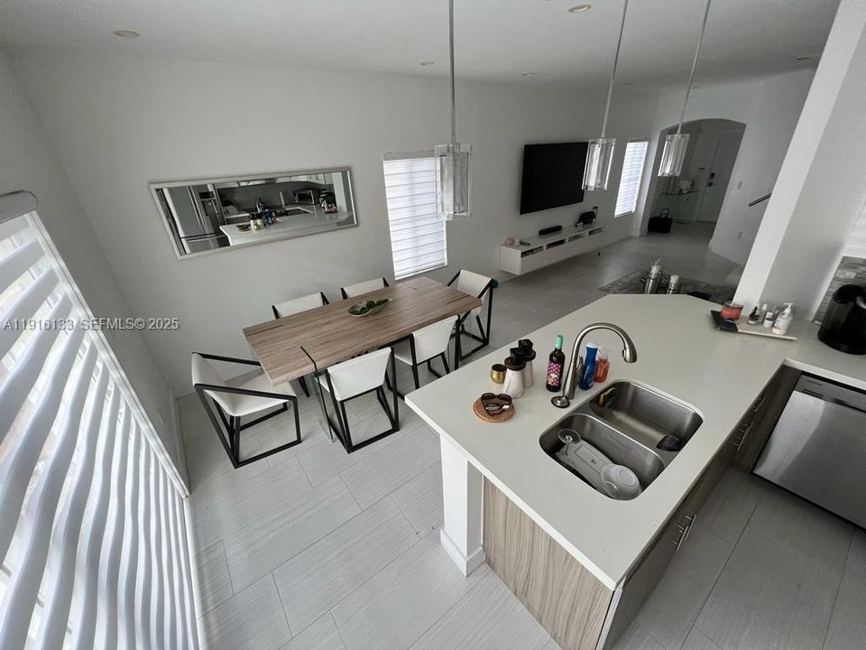 KITCHEN WITH VIEW OF DINING AREA