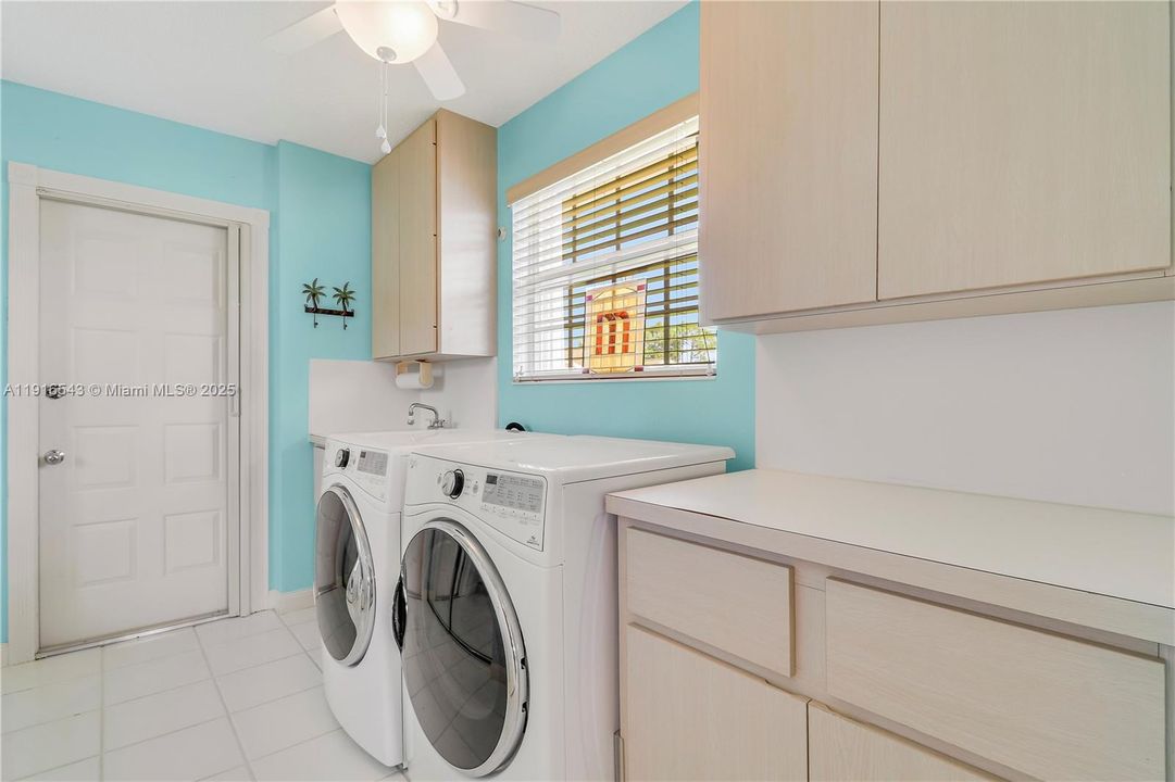 Laundry room with sink