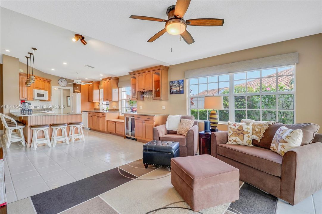Family room view to dining area and kitchen