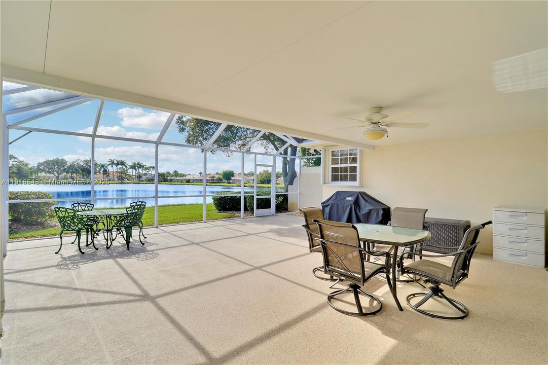Large covered patio area with fans