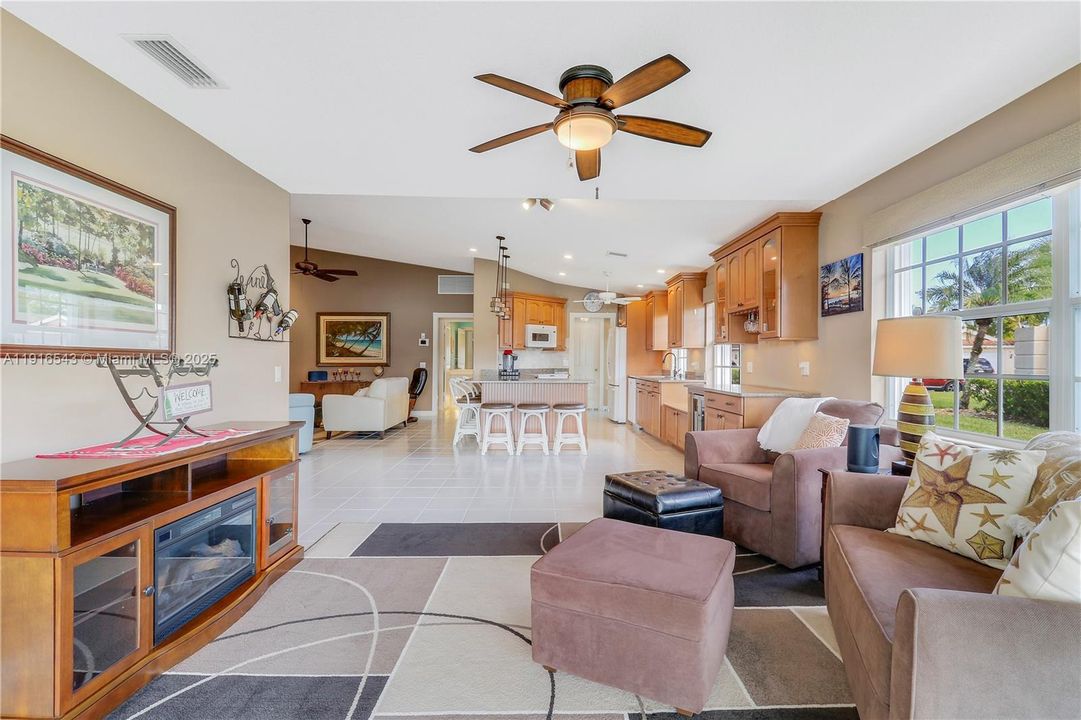Family room view to dining area and kitchen