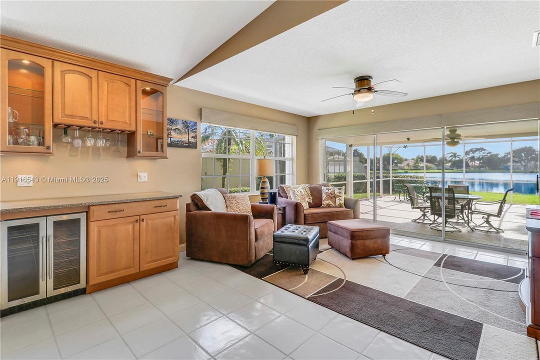 Extended kitchen serving area with wine cooler