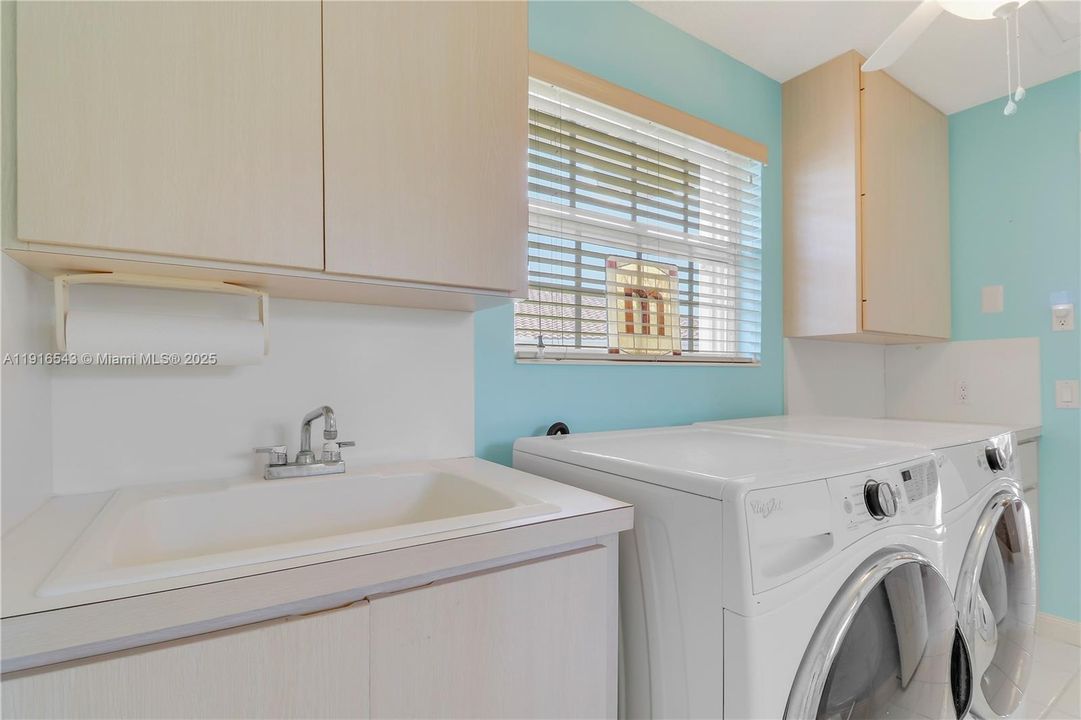Laundry room with sink