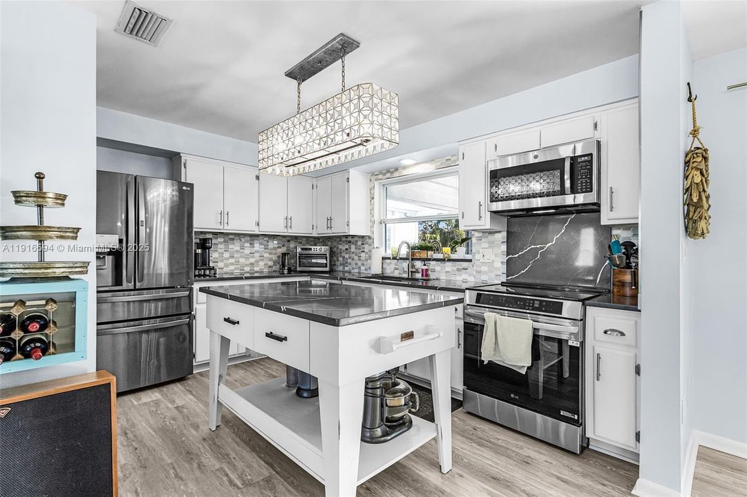 In person the flooring is a light tan.