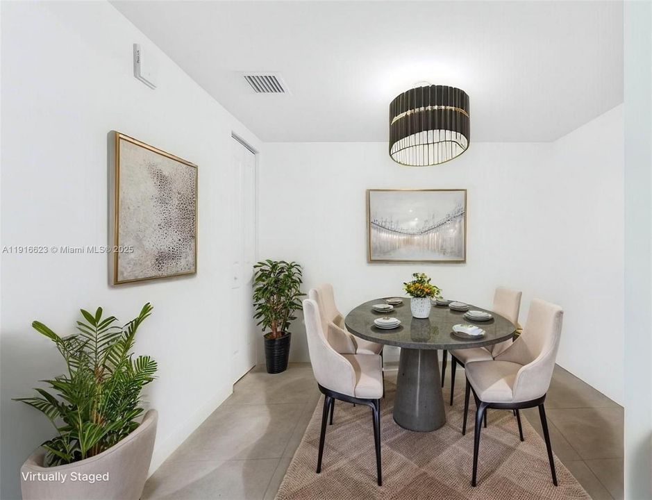 Den with closet can be used as dining, guest room or office space.