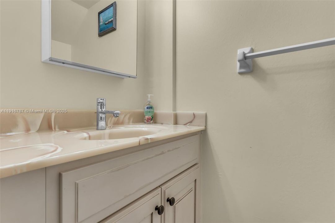 GUEST HALF BATHROOM ON FIRST FLOOR