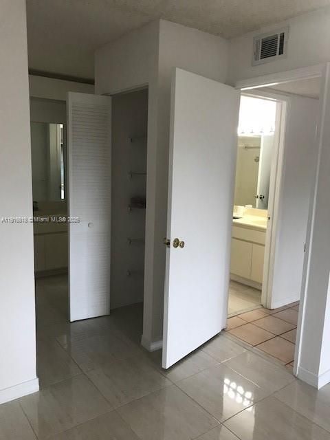 Second bathroom and third sink