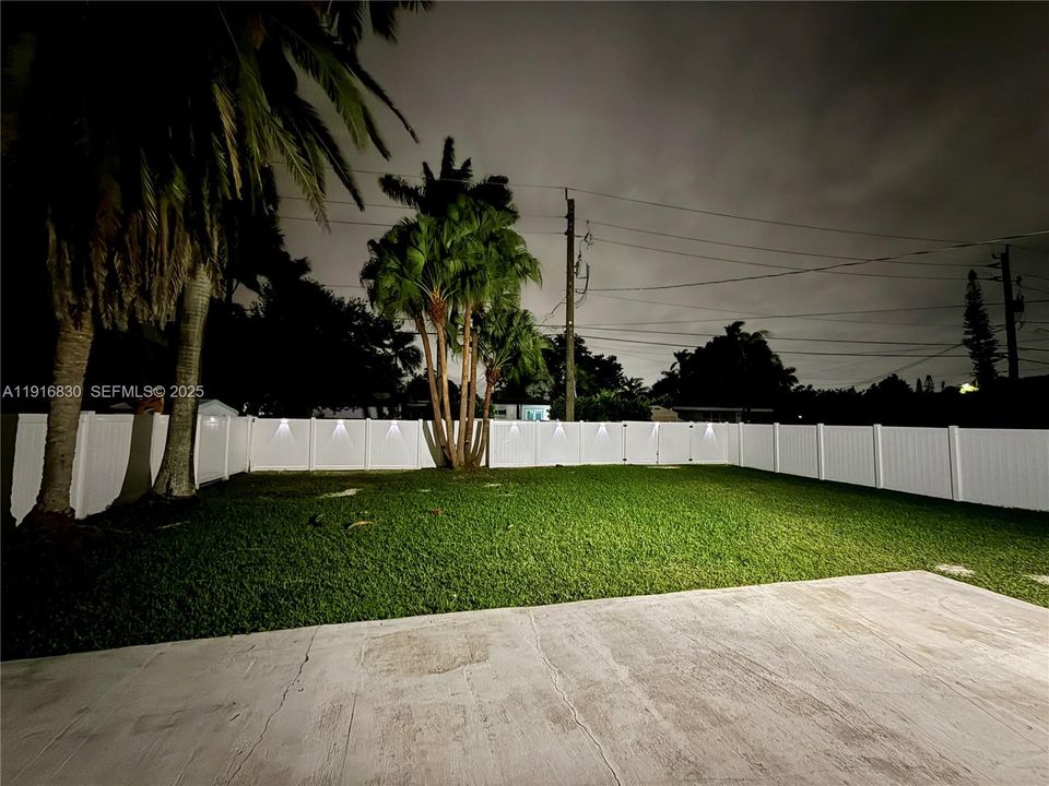 Huge Backyard, all fenced in with beautiful white vinyl fence, side gate and double swing back gate.