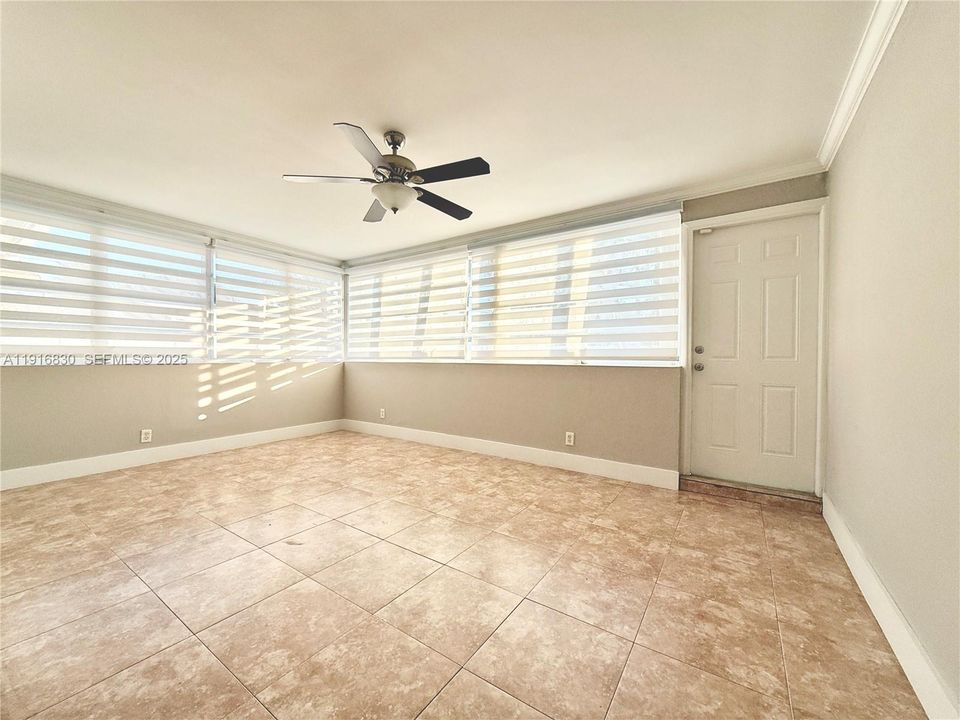 Large florida room with access to the backyard.