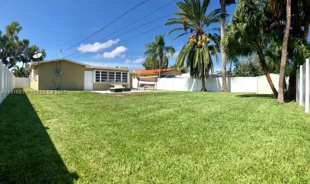 Huge Backyard, all fenced in with beautiful white vinyl fence, side gate and double swing back gate.