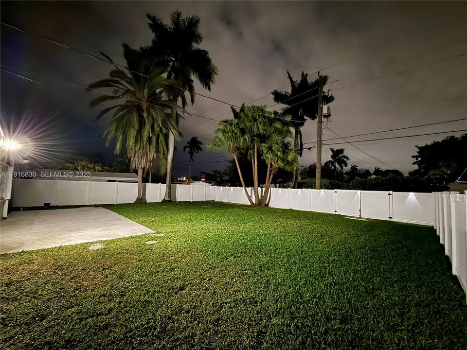 Huge Backyard, all fenced in with beautiful white vinyl fence, side gate and double swing back gate.